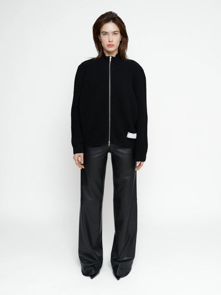 Juodas merino vilnos megztinis su užtrauktuku