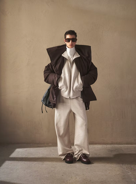 Wool-blend down featuring a detachable scarf-style hood striukė